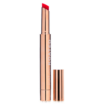 A rose gold tube and cap of Hint of Attitude tinted lip balm in Rent-Free - a cherry red with cool pink undertones